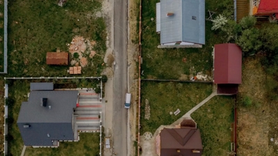 aerial view of home with roof