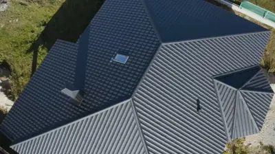 Mighty Dog Roofing team installing metal roofing on a Lakewood Ranch home for storm protection.