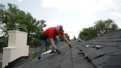 Snowbird homeowners inspecting their Sarasota roof after returning for the winter season.
