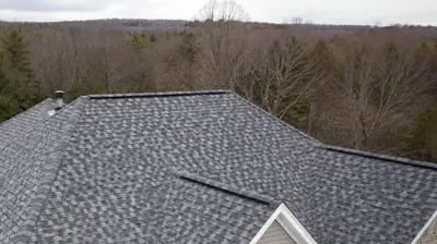 Coventry RI roof replacement with gray architectural shingles on a New England home