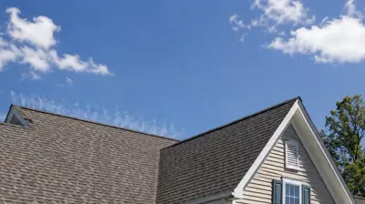 Rhode Island home with an energy efficient roofing system designed for summer heat and winter ice dam prevention.