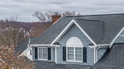 Lincoln, RI roof replacement correcting attic ventilation to reduce ice dams