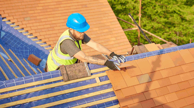 Trusted roofing contractor performing roof replacement