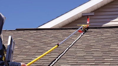 Roofing contractor providing roof maintenance