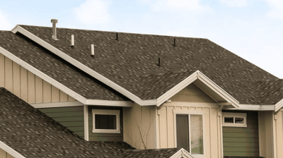 A roof replacement project on a steep roof pitch