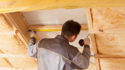 contractor installing new skylight