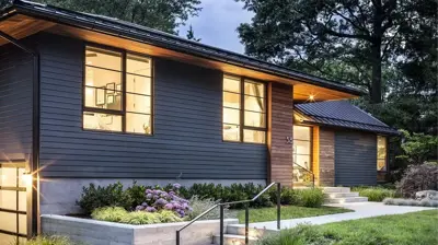 Dark siding transformation on a modern residential home exterior