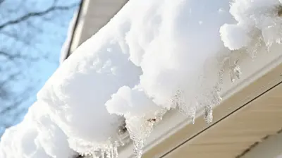 Expert gutter contractor needed for safe ice dam removal