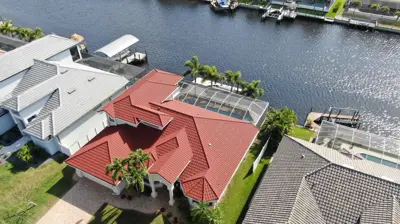 Mighty Dog Roofing of South Austin completing a premium shingle upgrade on a Sunfield home in Buda TX after a documented hail claim