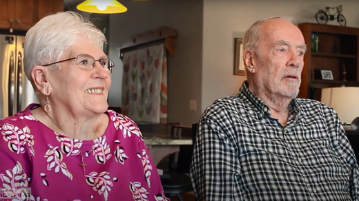 An old couple being interviewed in their home
