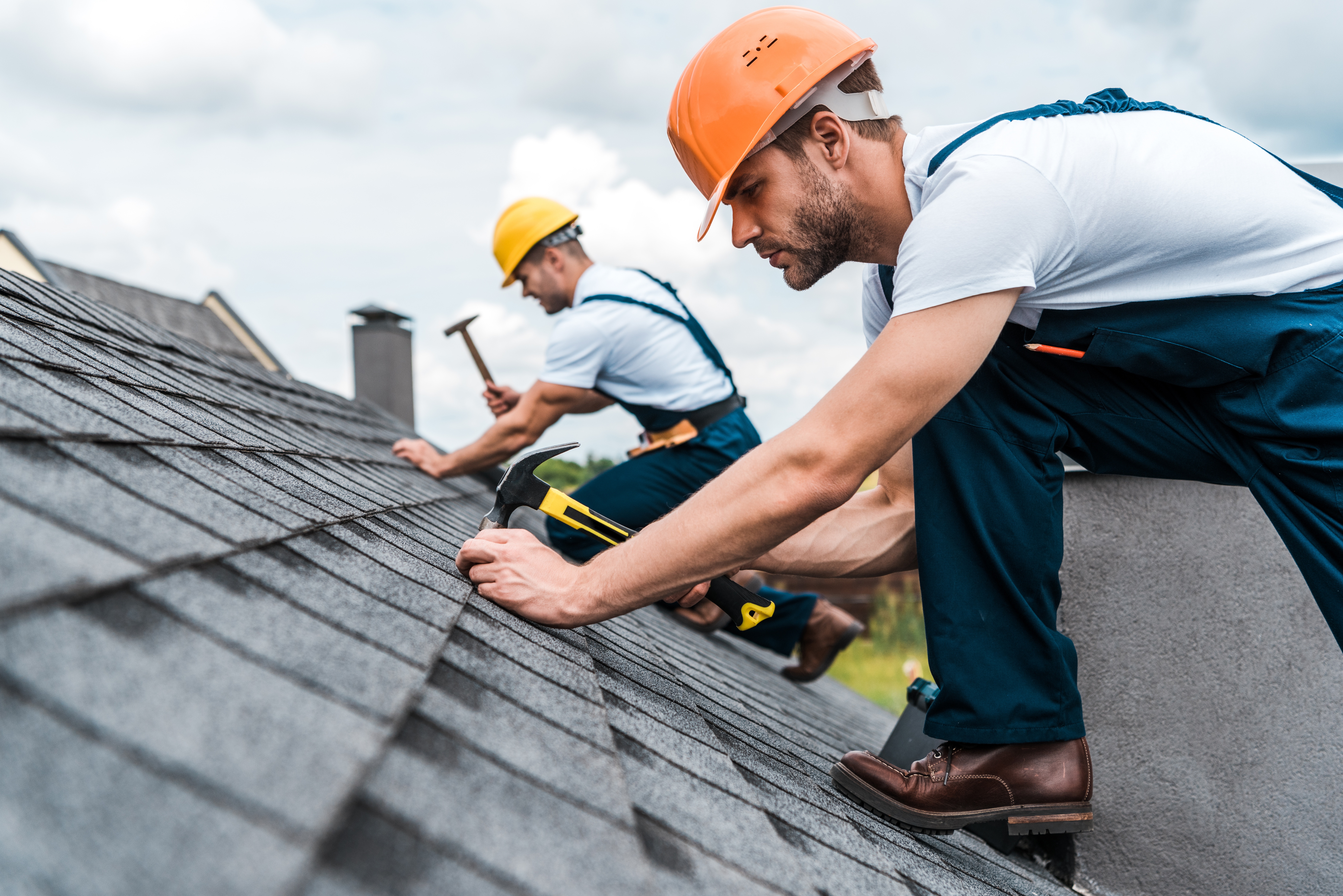 Roofing crew working on a home in Bradenton, FL
