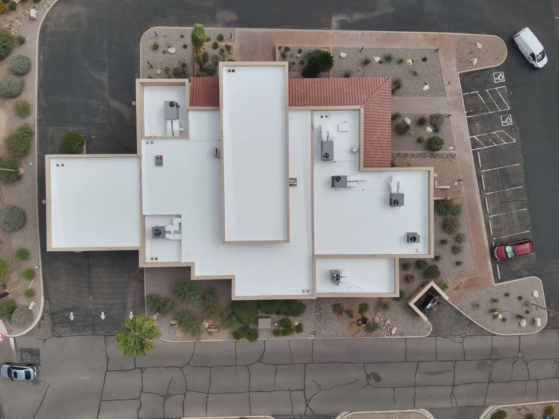 Commercial building - flat and tile roof replacement