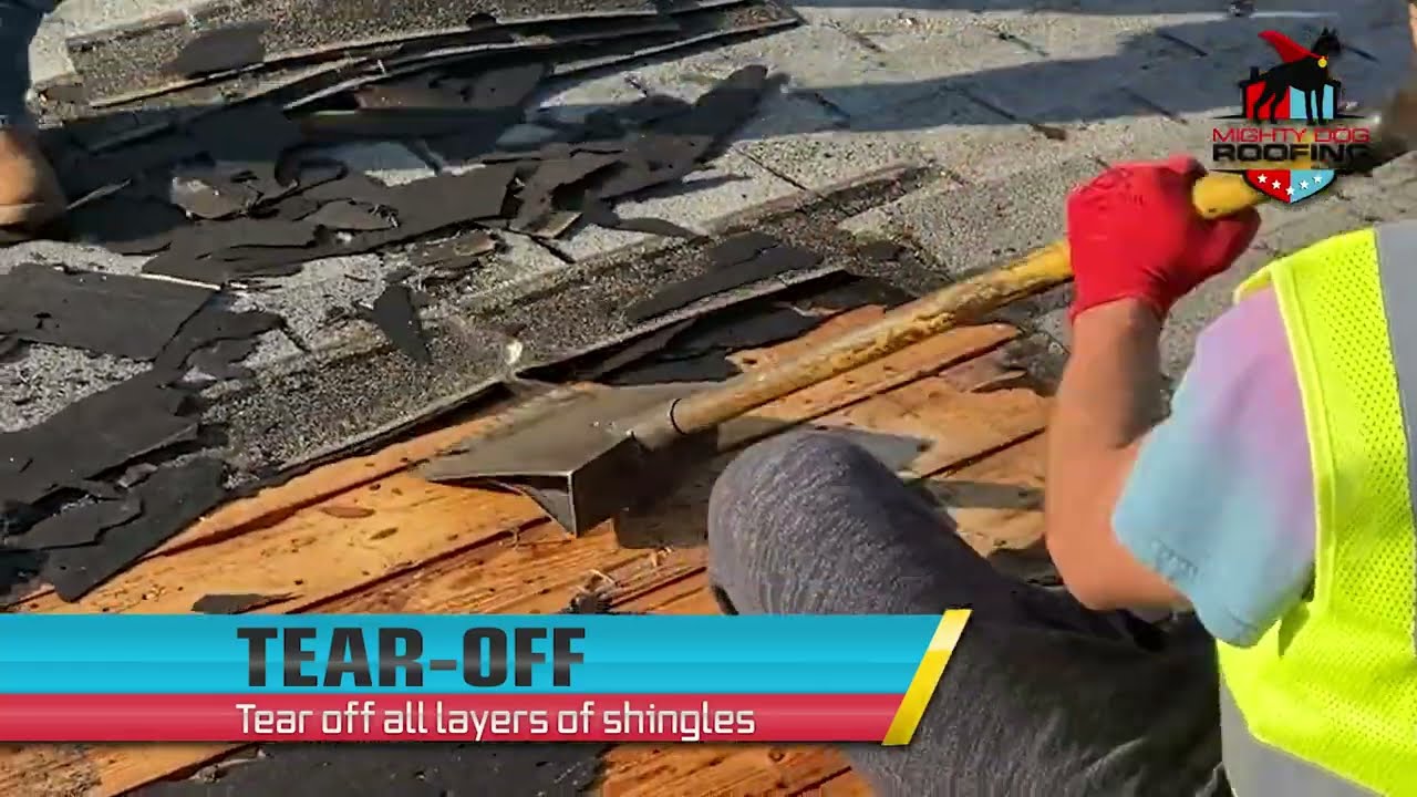 man working on a roof