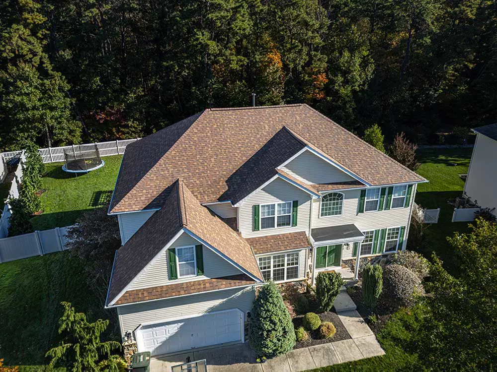 Complete roof replacement after photo showing new installed roof