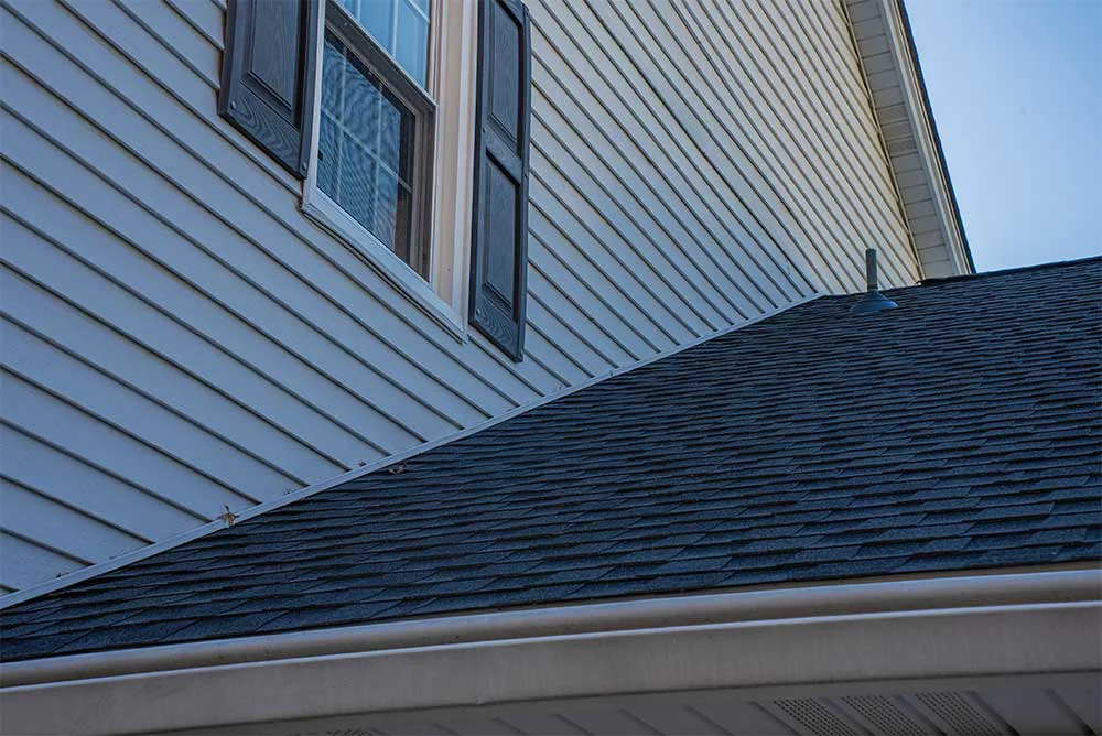 Asphalt shingle roofing system installed on a residential home in Sewell, NJ showing clean roof lines and proper edge protection