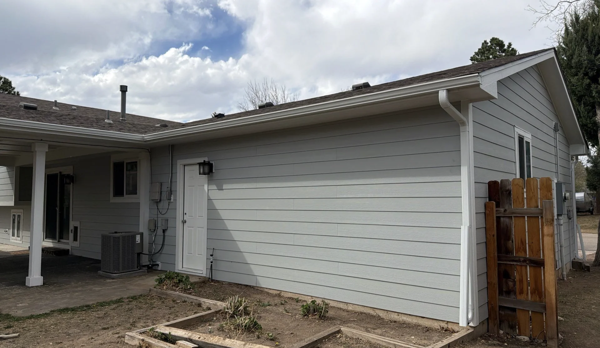 A newly resided home in Northern Colorado by Mighty Dog Roofing.