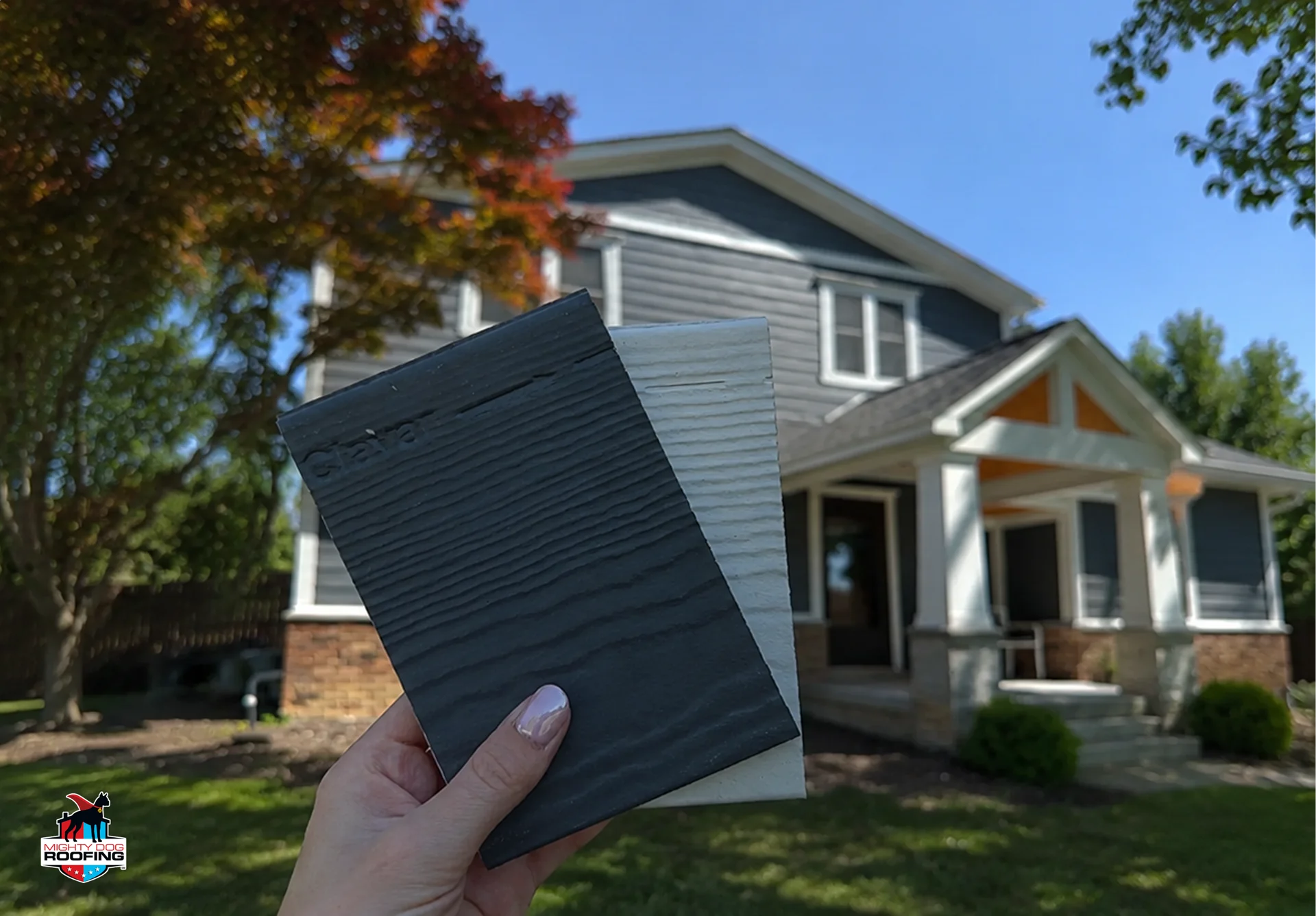 Siding contractor comparing materials