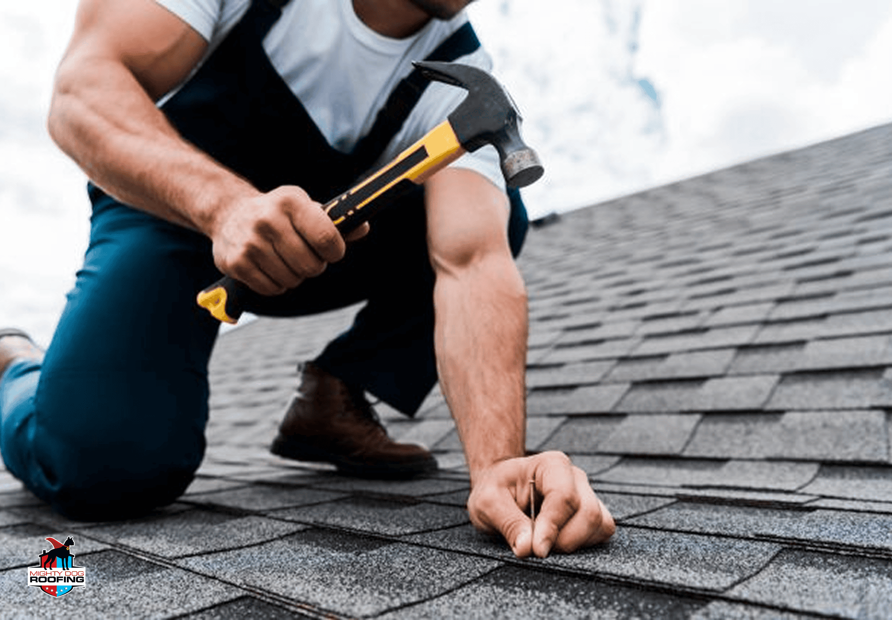 Professional roofer inspecting roof during maintenance service